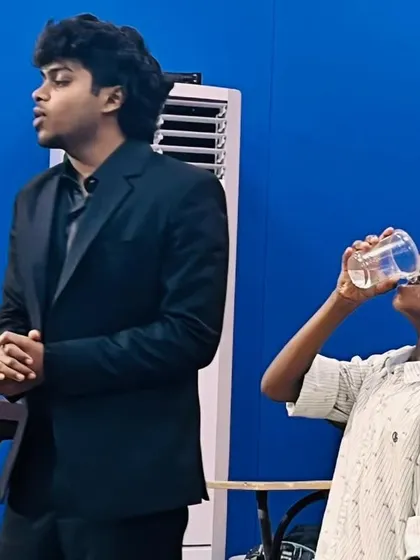 A funny moment where my young assistant takes a water break mid-show. These spontaneous, humorous interactions are what make each performance unique and enjoyable for the whole family.