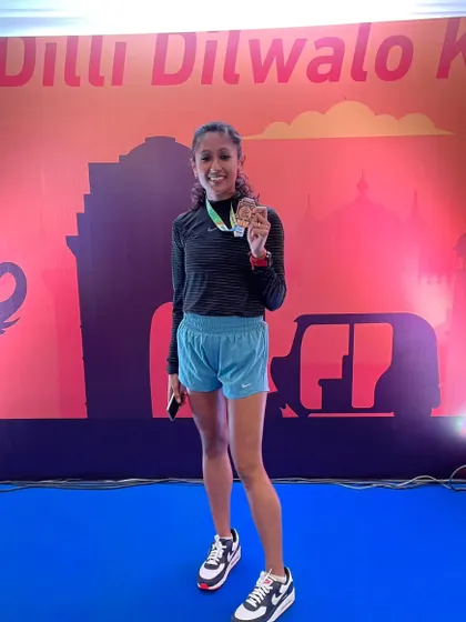 A second-place finish at the Delhi Half Marathon. This is me showing them why I never needed their doubt.