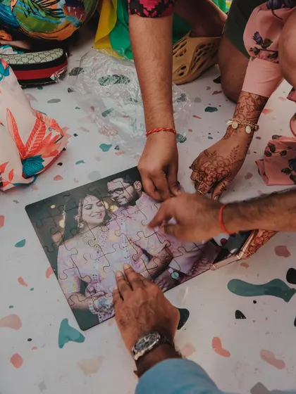 Guests work together to complete a custom jigsaw puzzle featuring a photo of the couple. A wonderful, interactive way to celebrate their union.