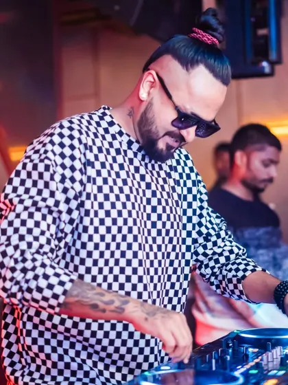 Focused on the mix at The Fixx. Every transition, every track selection is carefully considered to keep the party going.