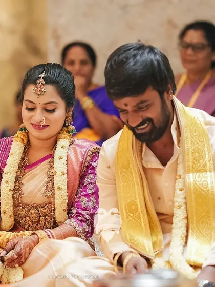 Kavya Maruthi's contemporary light pink raw silk corset blouse with sheer puffy sleeves and 3D embroidery for her housewarming.
