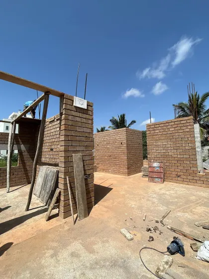 More scenes from our construction sites. These images document the journey of building, from laying rebar and curing concrete to the meticulous work of masonry, all part of bringing a sustainable home to life.