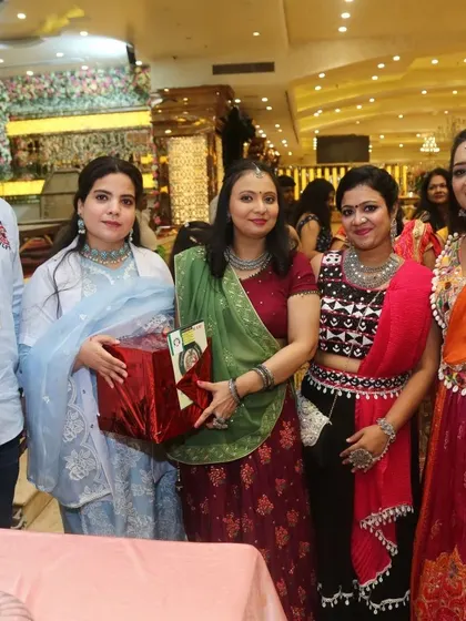 Gifting prizes and sharing smiles at the exhibition. Community events like these give us a chance to interact with people directly.