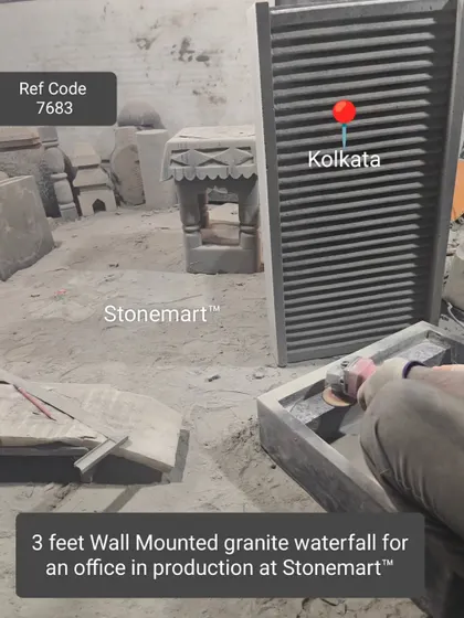 The production of a 3-foot wall-mounted granite waterfall for an office in Kolkata.