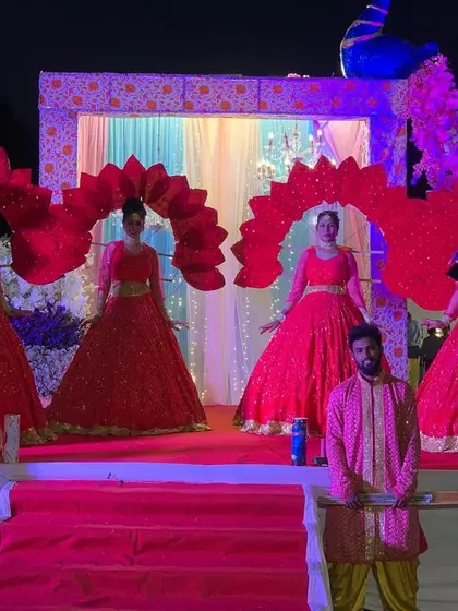 A duplicate image of our performers on stage, ready for a Grand Varmala entry.