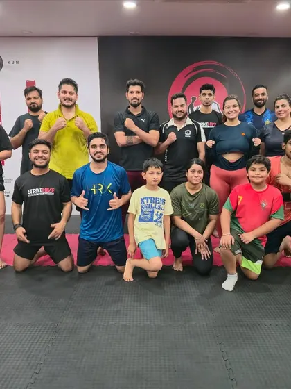 Saturdays are for training with the team. This group photo includes some of our youngest members, highlighting our all-ages approach.