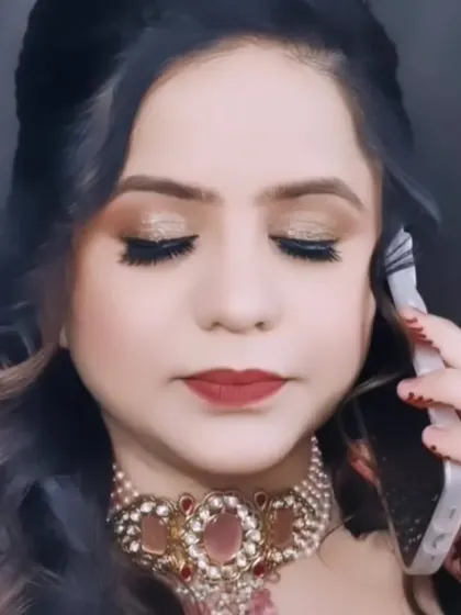 A candid moment showing off a glittery eye makeup look, perfect for an evening out.