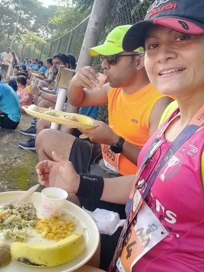 Enjoying a well-deserved post-race meal in Mangalore. Refueling together is part of the race experience.