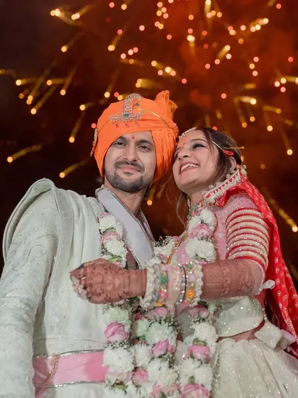 A love story written in the stars and lit by fireworks. The pure joy on the couple's faces is what I strive for in every wedding I plan.