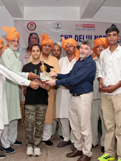 A student receiving her trophy at the 2nd Delhi NCR Open Karate Championship. We were honored to have international guests present.
