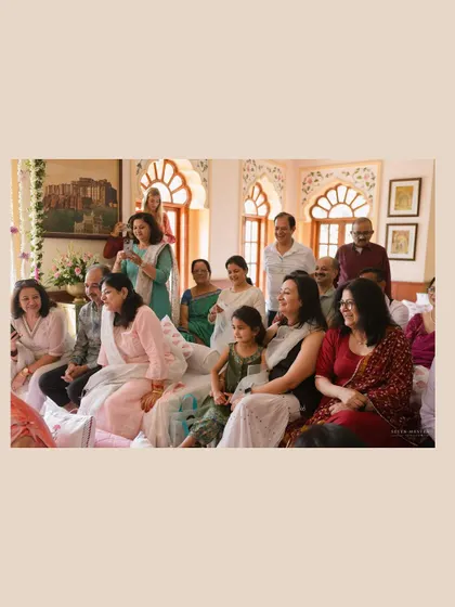 The family watching on. Capturing the reactions of loved ones is just as important as focusing on the couple, as it adds depth and context to the story.