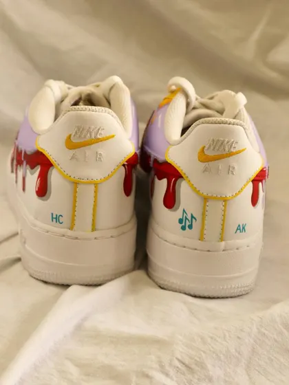 The back of the dripping paint AF1s, where I added the clients' initials and some musical notes to make the design even more personal.