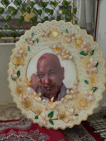 The full view of the large, scalloped-edge Guruji frame. This piece was a labor of love, and seeing it complete and ready for its new home was a moment of immense gratitude.