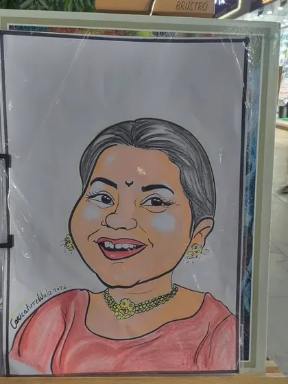 A beautiful color caricature of a woman, displayed on my easel. The color adds warmth and brings out her happy expression.
