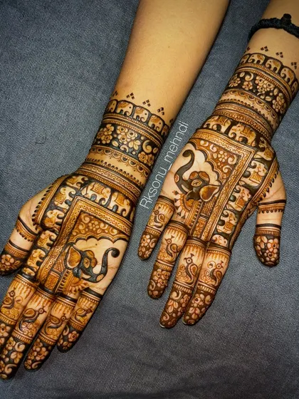 Here is a collection of my intricate bridal and engagement designs. Each one features a unique combination of traditional motifs like elephants, peacocks, lotuses, and personalized elements for the bride.