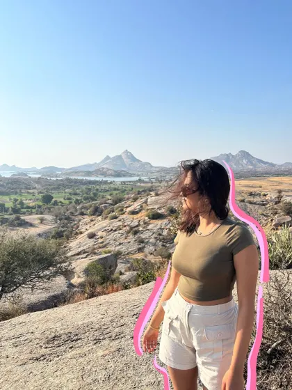 A simple outline doodle in pink adds a soft and romantic touch to this scenic photo from Jawai.