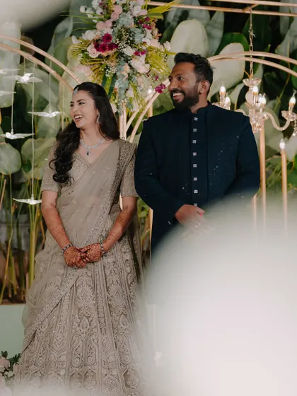 A happy couple enjoying their reception. The bride's makeup looks fresh and radiant all night long.
