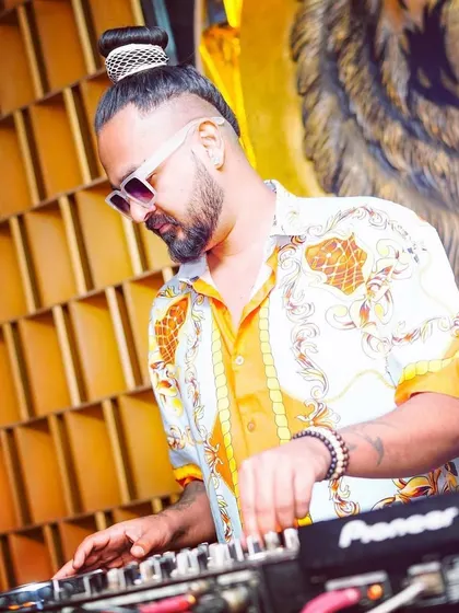 A shot of me at the console at Badmaash. I love the mix of traditional decor and modern party energy at this venue.
