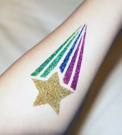 A shooting star with a rainbow glitter trail. This is a dynamic and colorful design that is very popular at birthday parties.