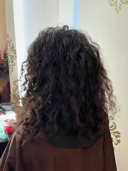 Before the transformation. Maya's hair had a lot of potential waiting to be unlocked.