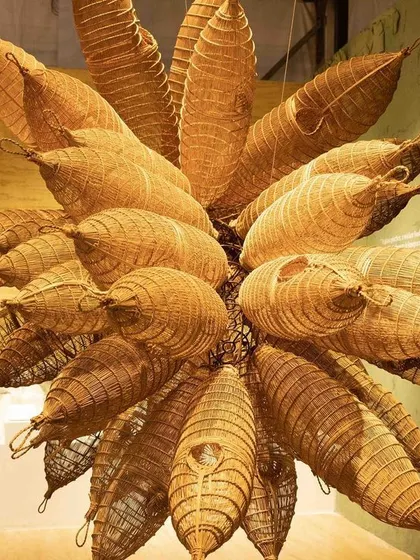 A sculptural rendition of a cluster of traditional Manipuri fish traps, known as 'Lu'. This piece was the centerpiece of our 'Edge of the Forest' installation, representing an inward journey to heal with ancestral wisdom.