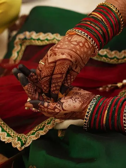 The final stain is just as important as the design itself. We use all natural henna to achieve this deep, rich reddish brown color that looks stunning in wedding photos.