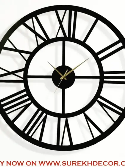 A close-up view of our classic vintage wall clock, highlighting the clean lines of the Roman numerals and the quality of the antique metal finish. This piece is available in multiple sizes to perfectly fit your space.