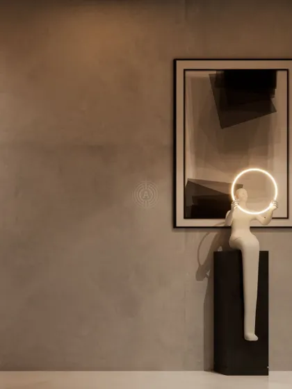 A small, artistic vignette from our Kolkata home render, showing how we use sculpture and lighting to create thoughtful, gallery-like moments.