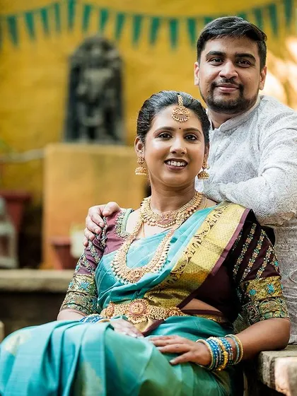 A portrait of a happy couple in a traditional setting. It's a joy for us to capture the stories of couples who trust us with their most important milestones.