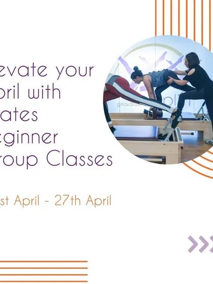 Join our beginner group classes to build strength together. This action shot from one of our classes demonstrates the focused, supportive environment we cultivate for our clients.