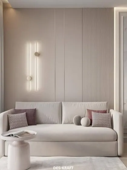 Another view of the serene living space, focusing on the comfortable sofa arrangement and the subtle interplay of light and shadow from the elegant wall sconces.