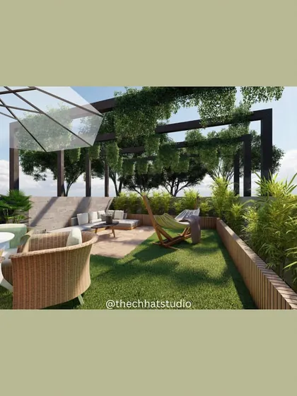 This terrace design is perfect for entertaining, with a dining area under an umbrella and a lounging space beneath a green pergola. It’s a functional and beautiful extension of the home’s living space.