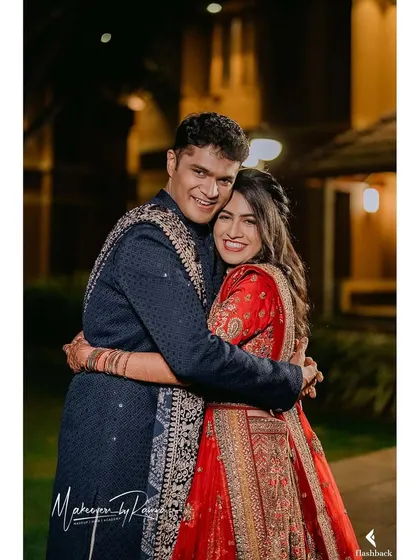Another shot of the couple embracing, their happiness is contagious.