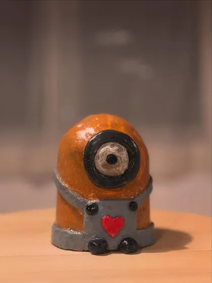 A finished Minion sculpture, painted and glazed. This little guy is ready to bring some fun and nostalgia to jego new home.