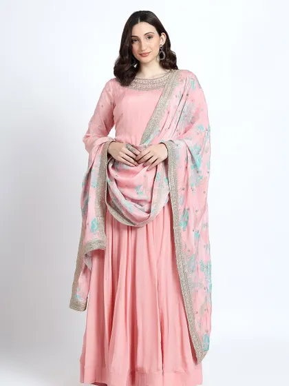A full view of the pink anarkali, showcasing its flattering silhouette and graceful drape.