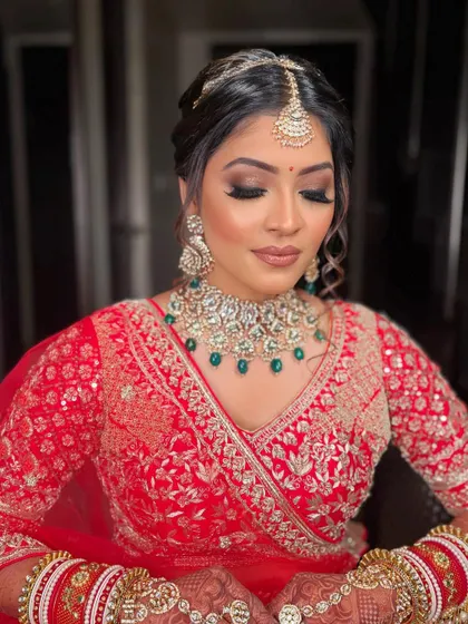 A detailed shot of Krisha's bridal eye makeup. The blended brown and gold shadows with a sharp wing create a timeless look that photographs beautifully.