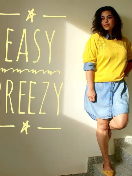 Easy and breezy is the perfect motto for relaxed days. This oversized denim shirt dress is comfortable and stylish, especially when layered with a pop of color.