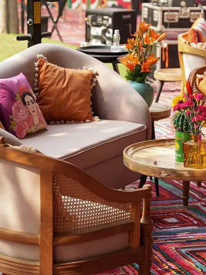 A duplicate of image 315, showing a cozy lounge area with a mix of modern and rustic furniture.