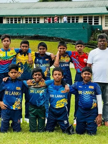 Our coaches and players pose with the local U-16 team in Sri Lanka.