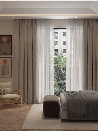 The vision for this bedroom was to create an elegant and luxurious space with a sense of privacy. The room is magnificent yet subdued, with a focus on a calm color palette and comfortable furnishings.