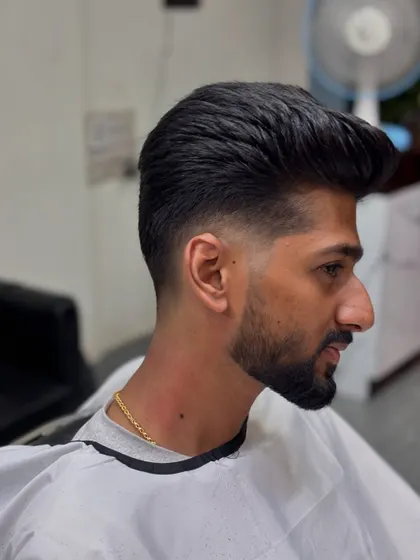 A final shot of the pompadour, showing the sharp lines and impressive height.
