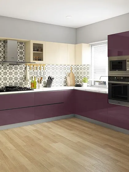 A bold and beautiful L-shaped kitchen with glossy purple cabinets. The patterned backsplash adds a fun, artistic touch, while the cream-colored upper cabinets keep the look balanced.