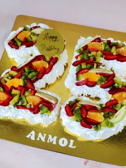 A 25th birthday or anniversary calls for a showstopper! This number cake is made with my white chocolate mousse flavor and topped with a colorful array of fresh fruits.
