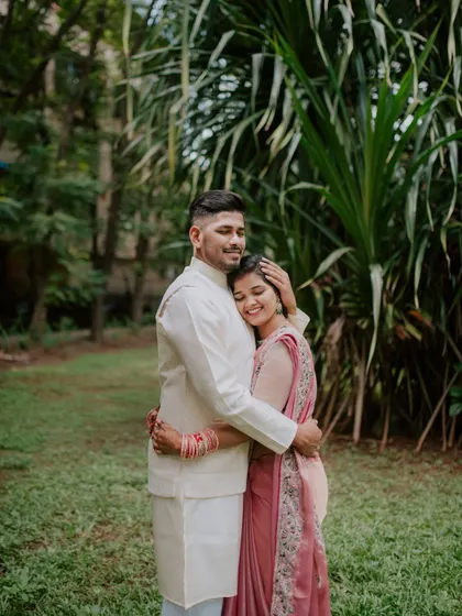 A sweet and tender hug between the newly engaged couple.