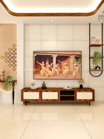 This TV unit wall incorporates a traditional Kolam design, blending cultural motifs with modern aesthetics. The design is a beautiful celebration of South Indian heritage.