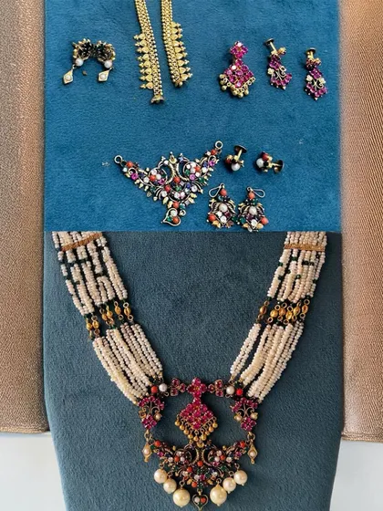 This transformation shows how we can combine multiple small, mismatched pieces into one cohesive and stunning bridal haar. We used various old earrings and pendants to create this beautiful pearl and multi-gemstone necklace.
