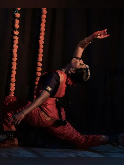 A powerful, grounded pose from the Devi Stuthi performance, radiating divine energy.