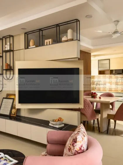 This living room features our custom-designed rotating TV unit, shown here facing the seating area. The design includes open shelving for display and closed storage, making it both functional and stylish.