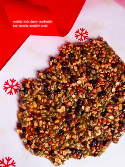 The brittle is studded with chewy cranberries and crunchy pumpkin seeds.