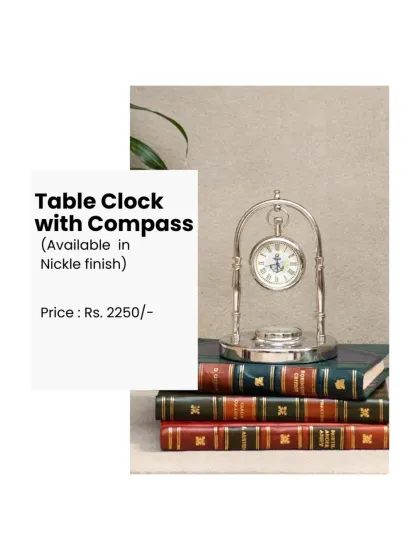 Our table clock with a compass is a popular choice. Available in a nickel finish, it sits elegantly on a stack of books or a desk.